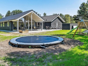 18 person holiday home in Bl vand